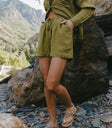 green shorts with matching green button up