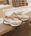 natural sneakers with black gumsole