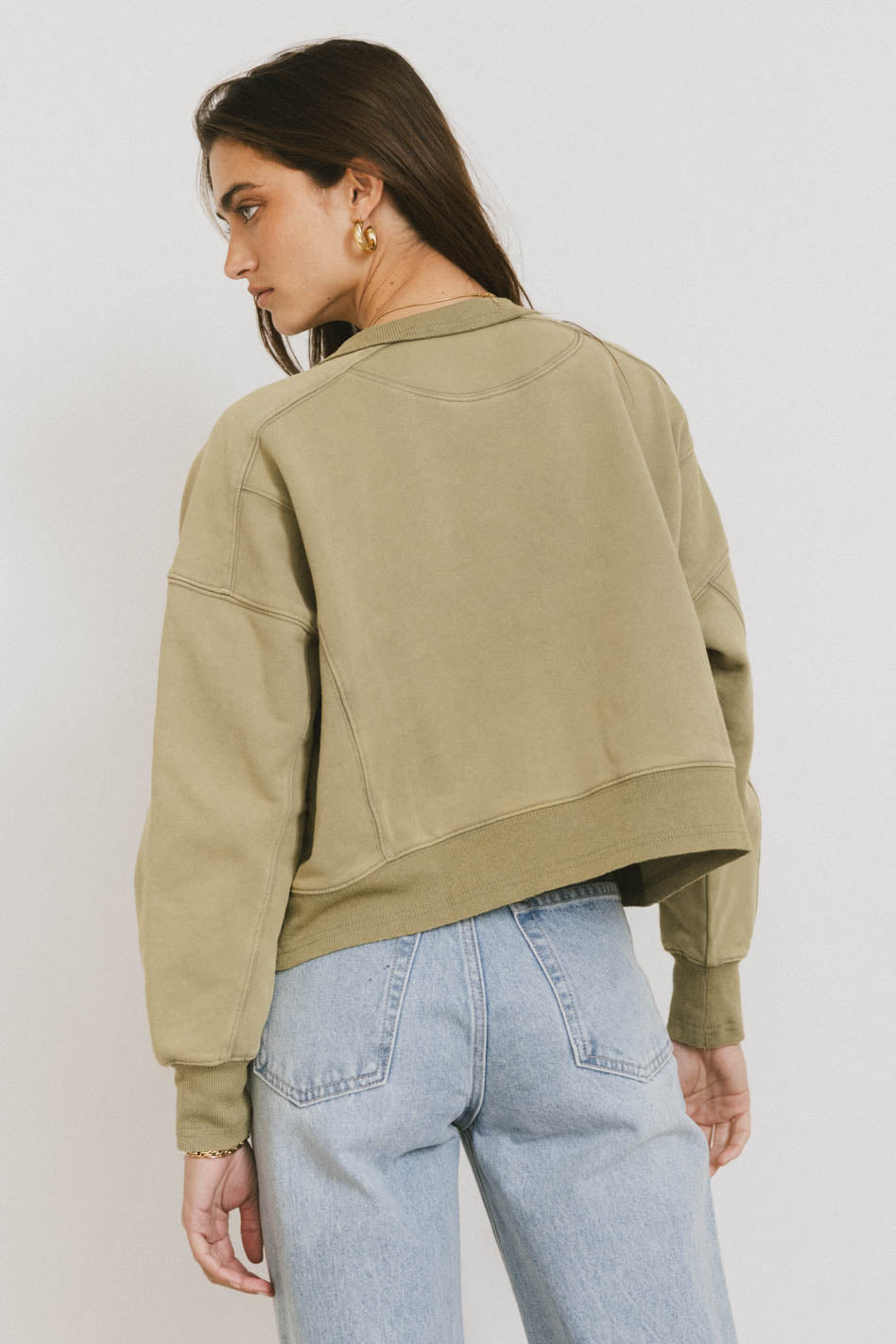 green cropped sweater