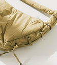 green tassel side detail puffer bag