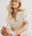 collared knit top with buttons
