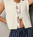 white sweater vest with two front ties
