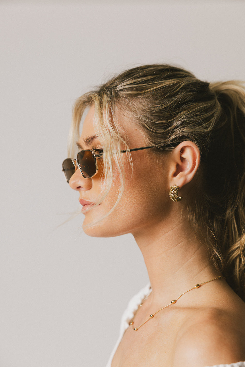 brown lens sunglasses