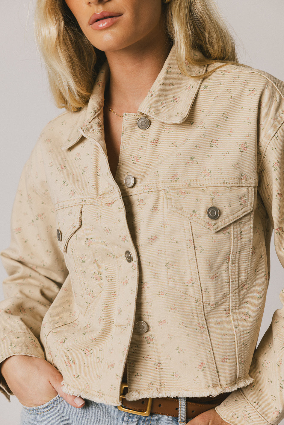 denim jacket with floral pattern