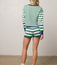 white shorts with green stripes