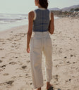 BACK POCKETS ON BARREL JEANS