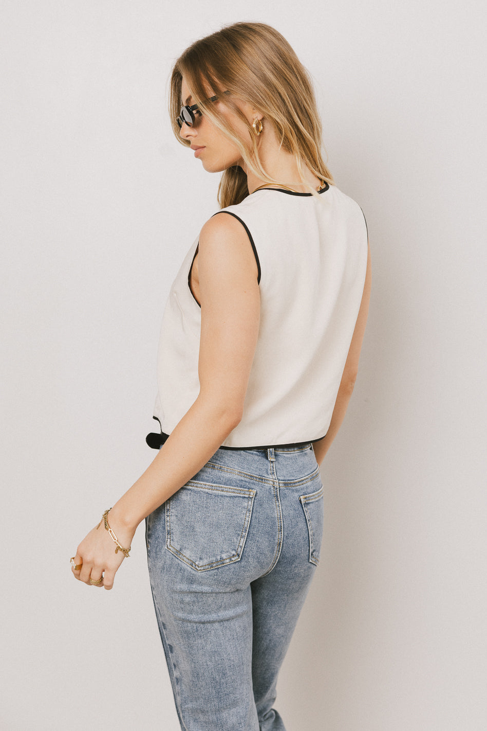 CREAM VEST WITH BLACK TRIM