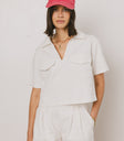 CREAM PLEATED SHORTS