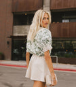 green floral blouse