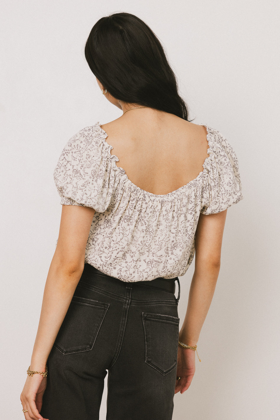 DEEP BACK ON PRINTED BLUSE