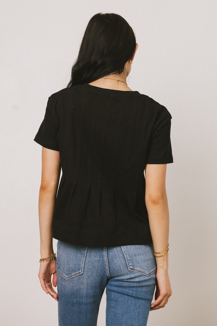 black pleated shirt