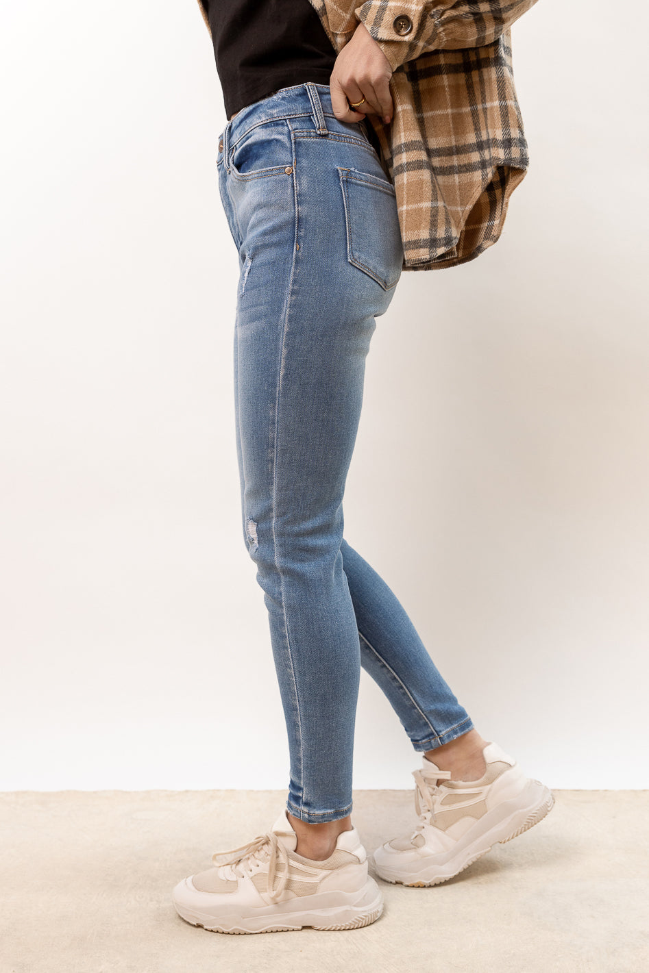medium wash skinny jeans distressed