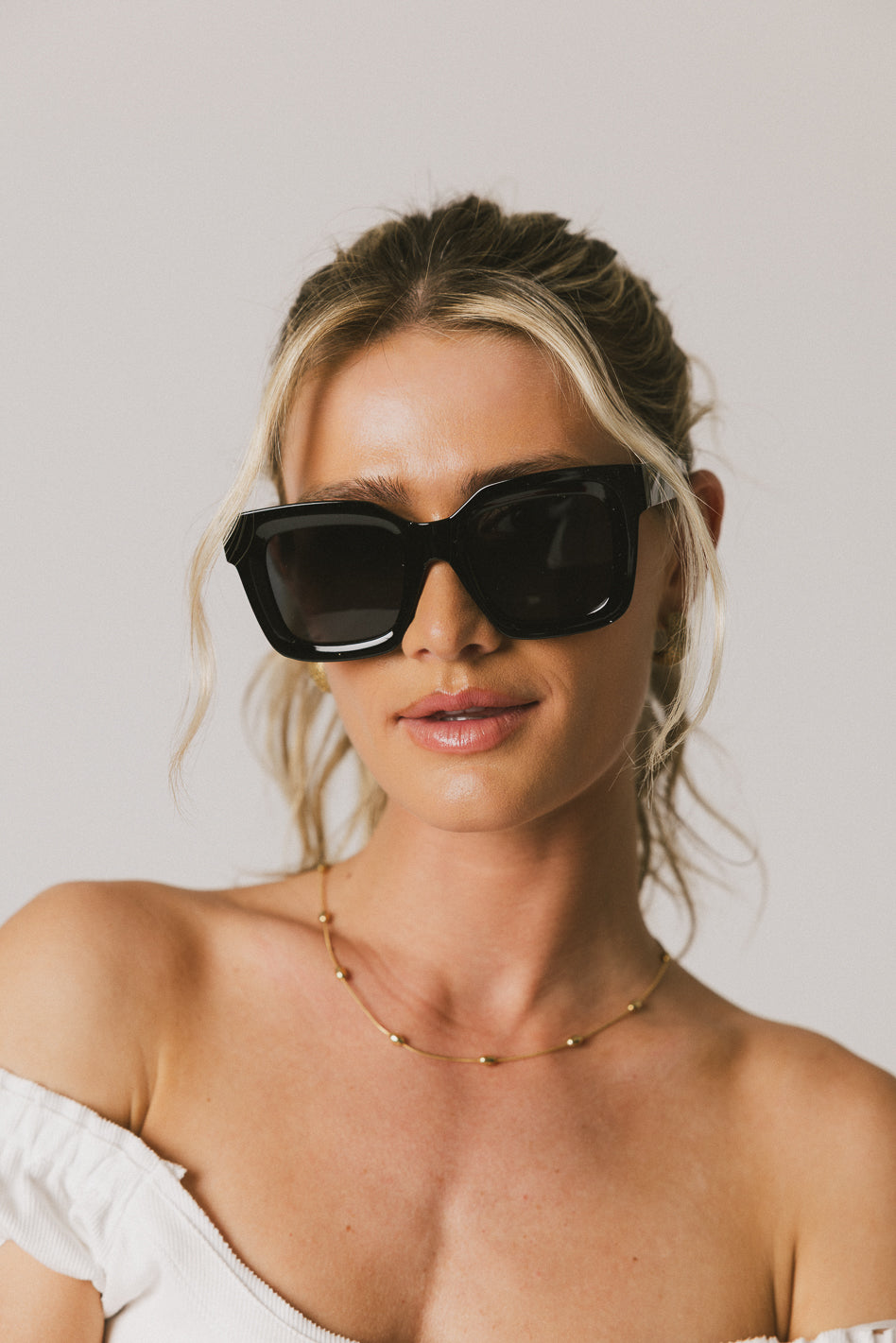thick rimmed sunglasses